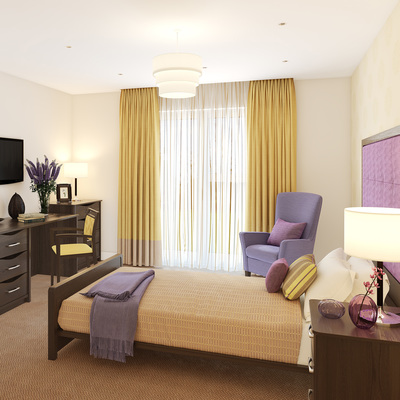 Care bedroom with wide care bed, yellow and purple